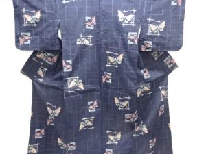 蝶模様織出し手織り紬着物